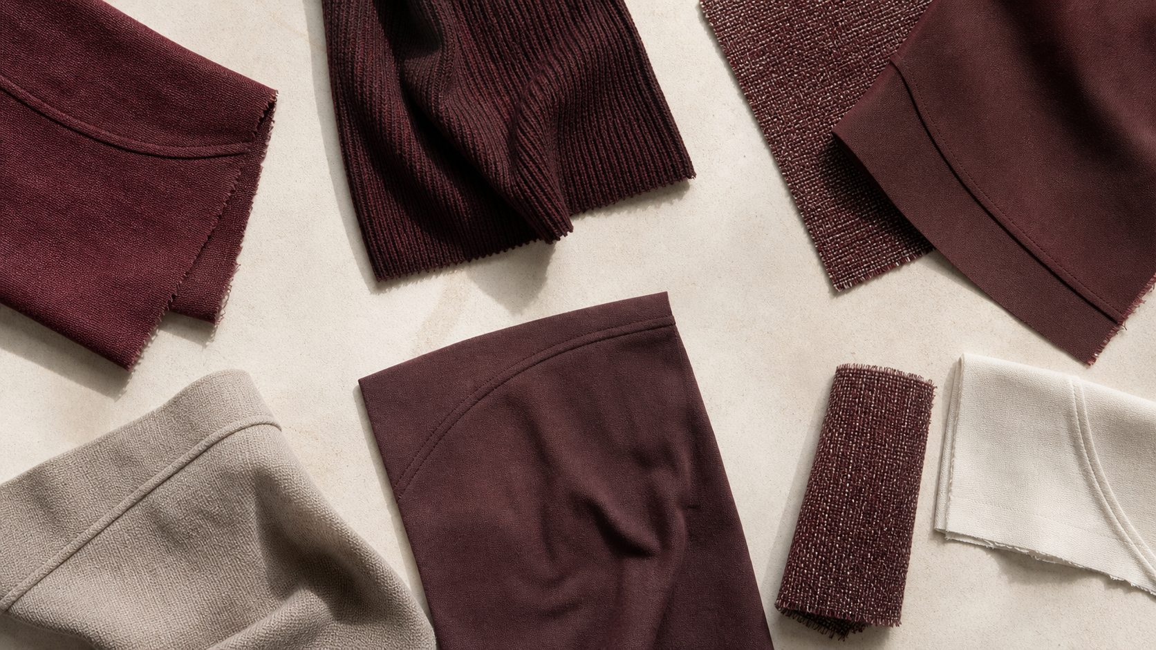 Equal garment fragments connected by repeated colour, line and texture without exact matching.